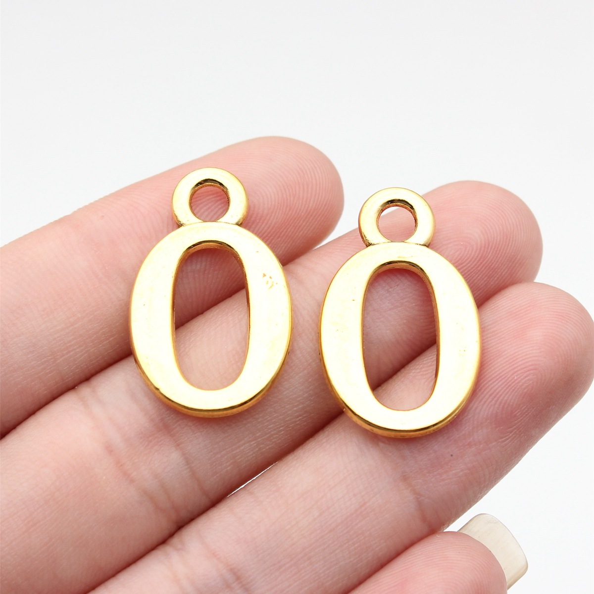 Vintage Fashion Online - 10 Stück 26x16mm Antikgoldfarbene Zahlen 0~9
