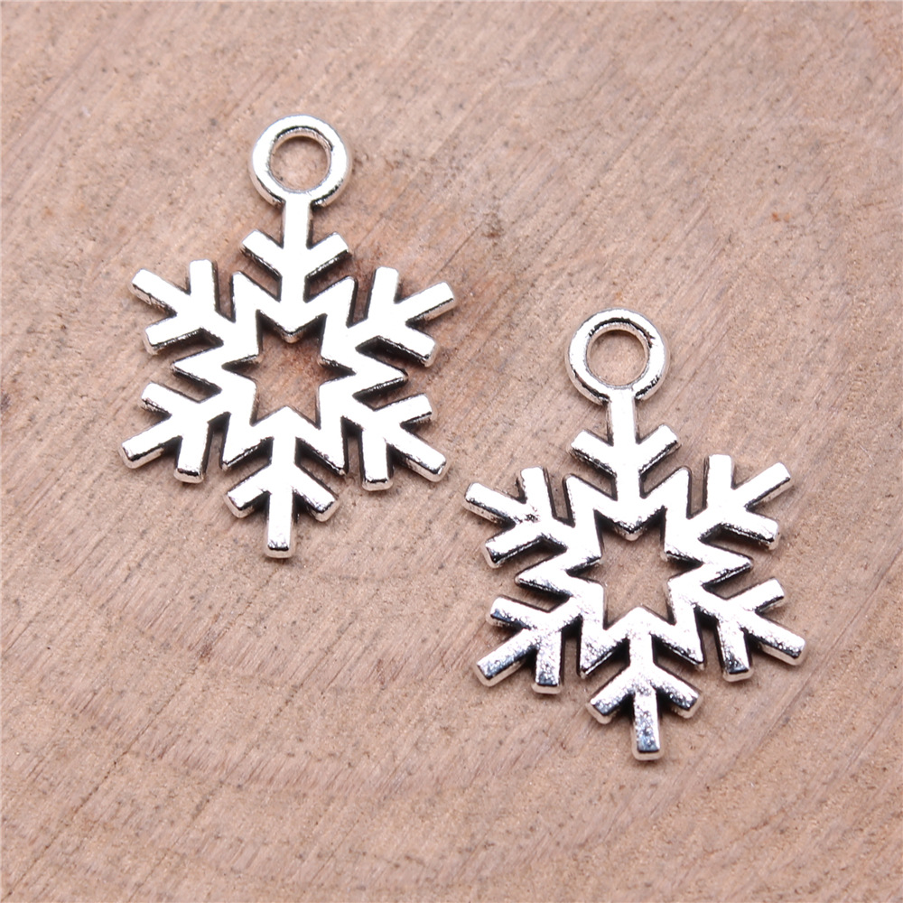 Vintage Fashion Online - 40 Stück 19x14mm (0,75x0,55 Zoll) Schneeflocken-Anhänger